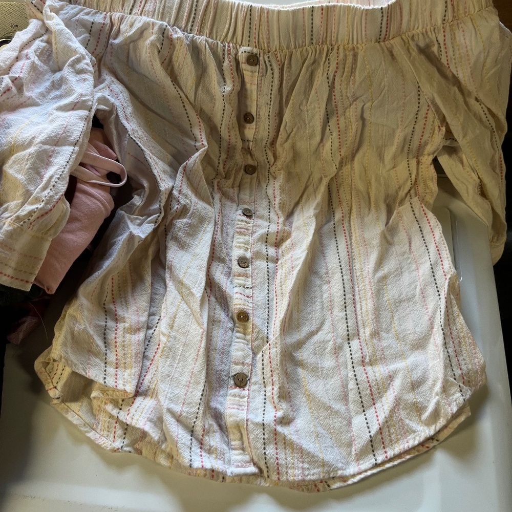 Iz Byer off the shoulder top